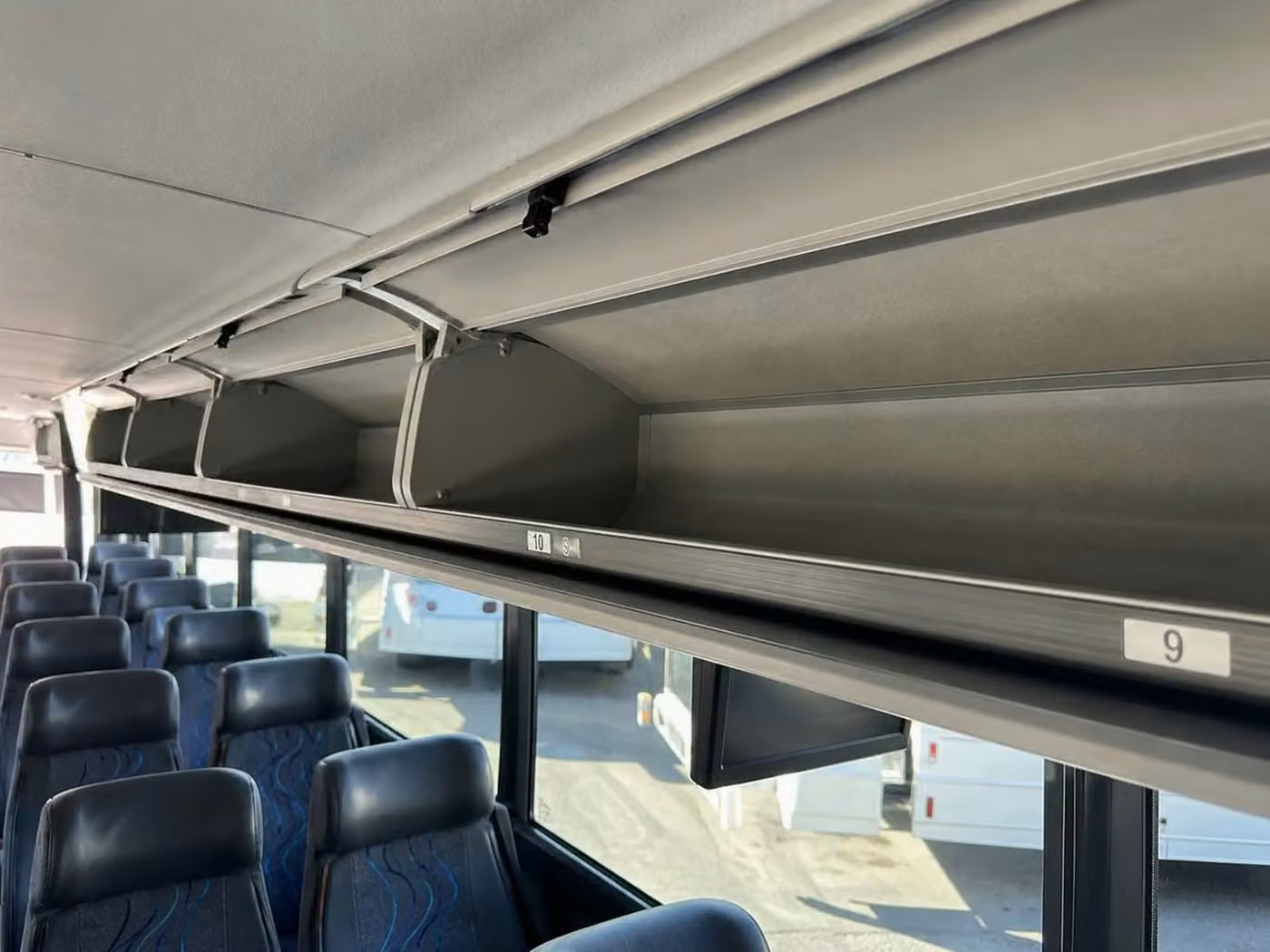 west hollywood 56 passenger charter bus overhead storage